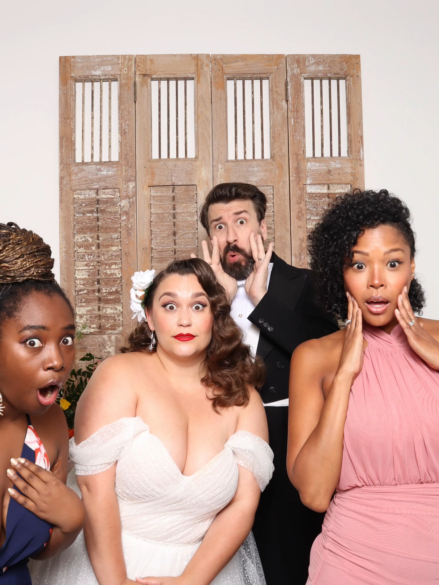Group posing at the Guac & Chips photo booth